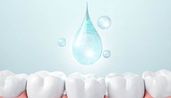 An illustration showing fluoride strengthening tooth enamel