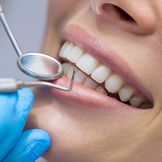 Patient receiving gum recontouring treatment