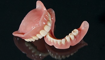 Pair of full dentures in Brick Township