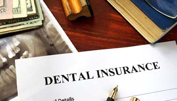 dental insurance form on table