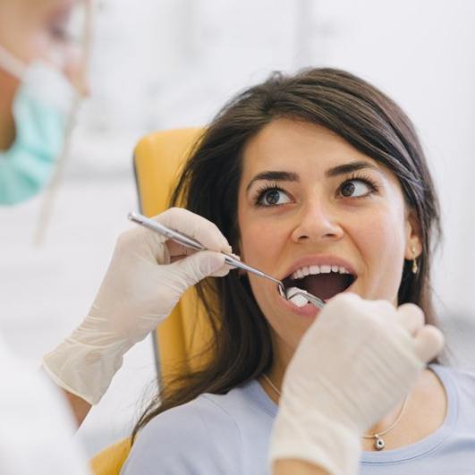 a patient getting their gums checked