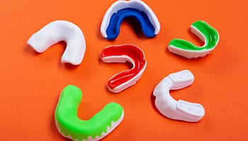 Series of mouthguards resting on a table