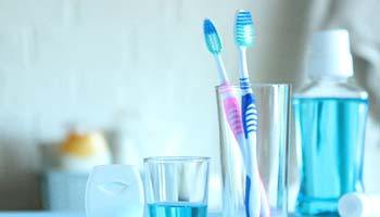 Toothbrushes and mouthwash used to care for dental implants I Brick Township
