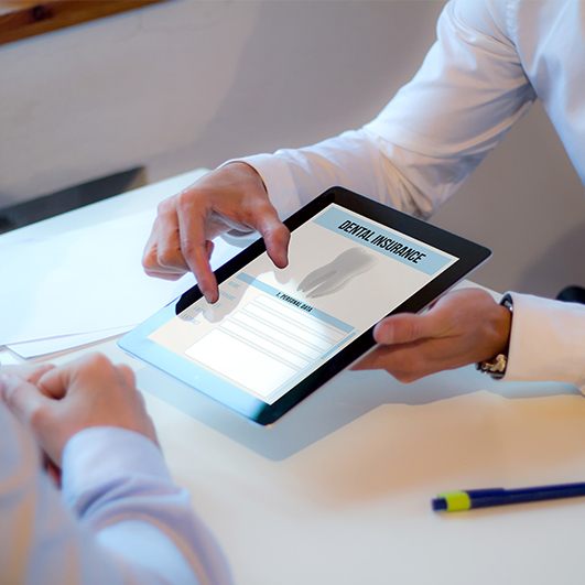 Dental insurance forms on tablet computer