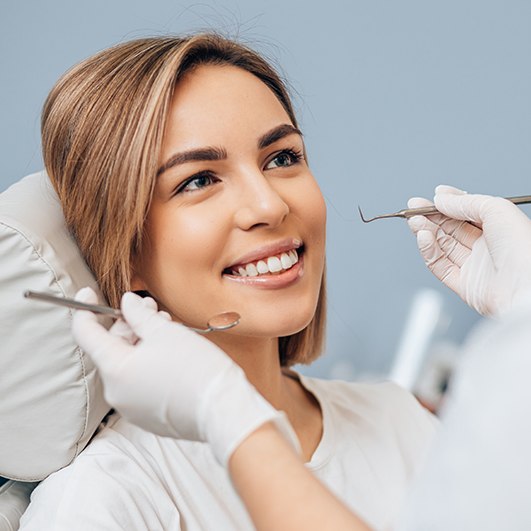 Woman receiving dental treatment