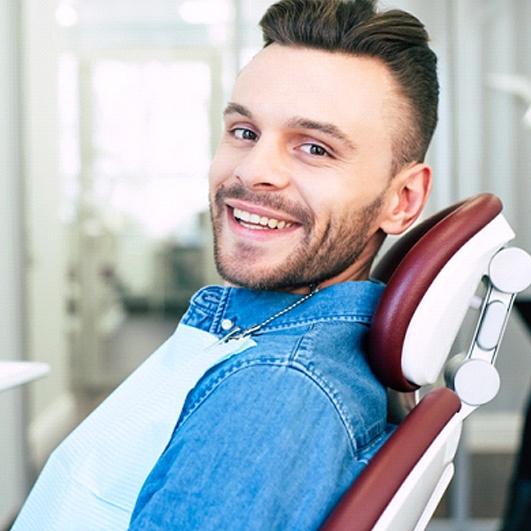 Man sitting up and smiling after receiving nitrous oxide in Brick Township, NJ