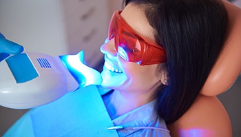 a patient undergoing the cost of teeth whitening in Brick