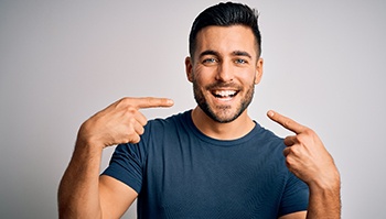 a man smiling after cost of teeth whitening in Brick