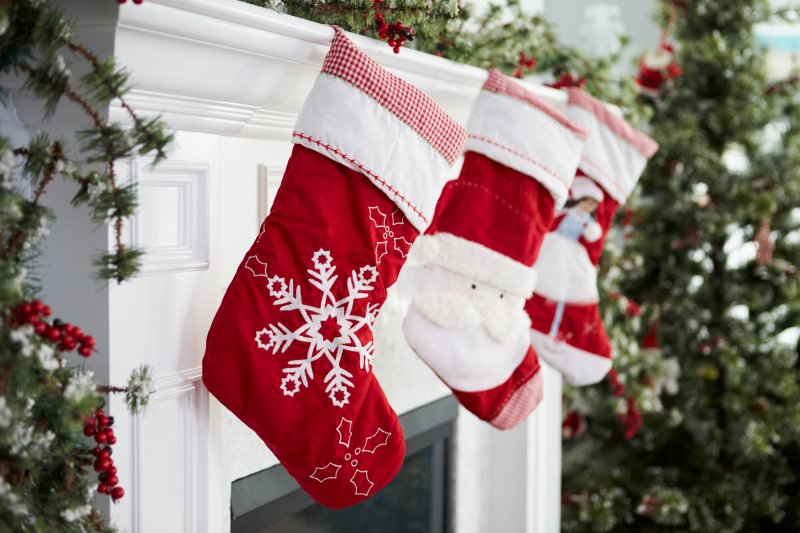 Stockings hung up by a fireplace